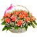 basket of coral roses with babys breath. Kenya